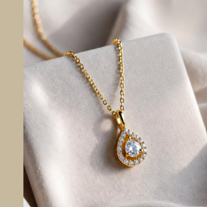 Pear-cut halo pendant necklace in yellow gold finish