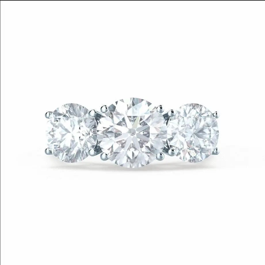 Round Brilliant Cut White Gold Trilogy Ring - cushionblue