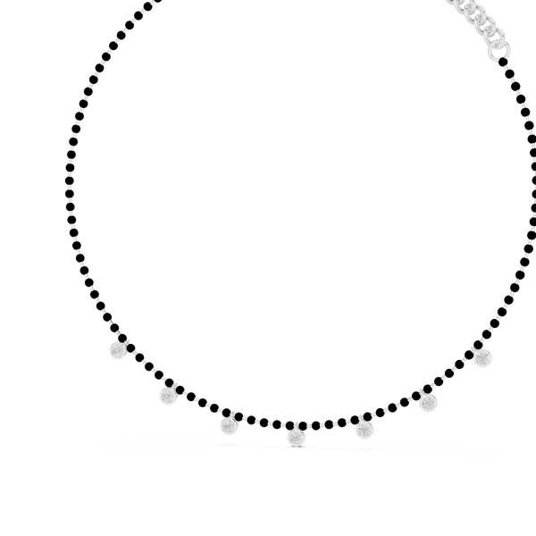 White gold tennis necklace featuring a continuous row of round brilliant diamonds in a classic and timeless luxury design.