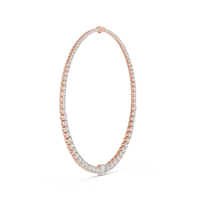 Rose gold tennis necklace featuring a continuous row of round brilliant diamonds in a classic luxury jewelry design.