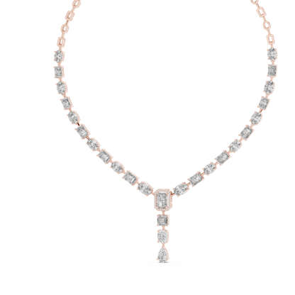 Rose gold diamond drop necklace featuring emerald-cut, oval-cut, and pear-cut diamonds in an elegant halo pendant design.