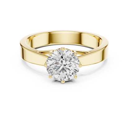 Gold ring with a diamond on a white background