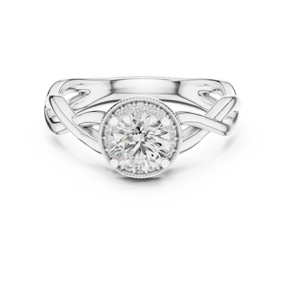 Round brilliant diamond engagement ring in white gold with an intricate openwork band and sparkling accent diamonds.
