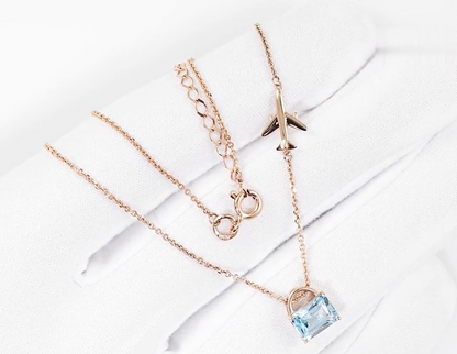 14K Gold Emerald Cut Sky Topaz Pendant | Solitaire Topaz Necklace | Airplane Charm Pendant,  | Flying High Necklace | Birthday Gift for Her. Cushionblue