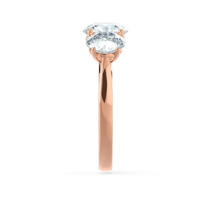 Round Brilliant Cut Rose Gold Trilogy Ring - cushionblue