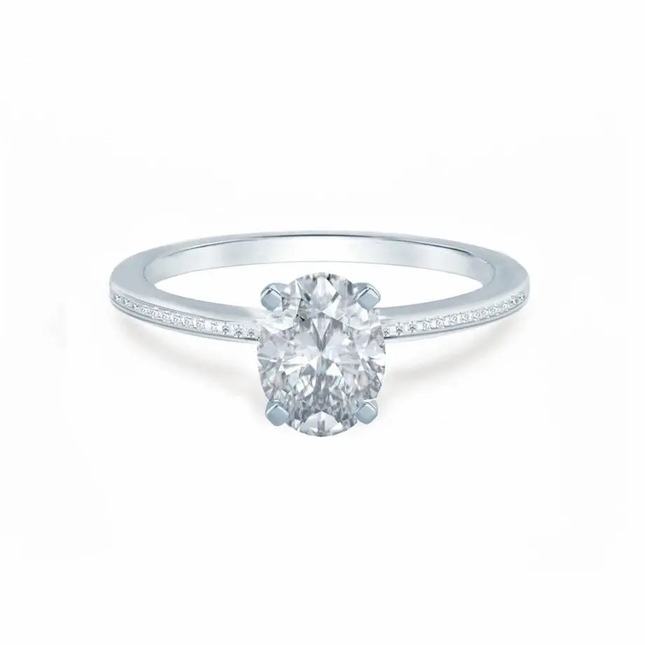 Oval Cut White Gold Petite Channel Set Solitaire Ring - cushionblue