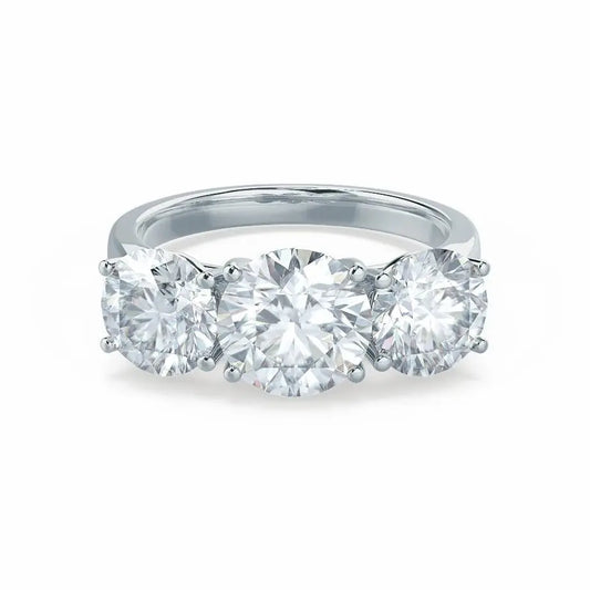Round Brilliant Cut White Gold Trilogy Ring - cushionblue
