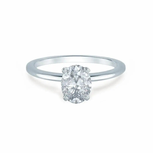 Oval Cut White Gold Diamond Solitaire Ring - cushionblue
