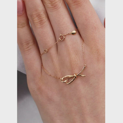 Yellow Gold Ribbon necklace with diamonds