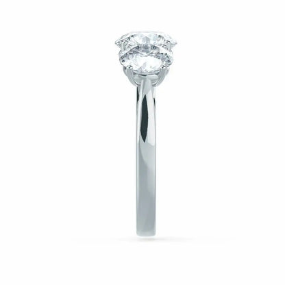 Round Brilliant Cut White Gold Trilogy Ring - cushionblue