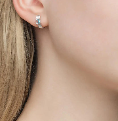 White Gold Latch back earrings with Topaz and diamonds - cushionblue