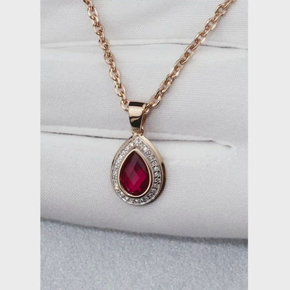 Rose Gold pear pendant necklace with ruby and diamonds