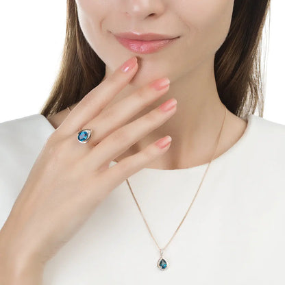 Rose Gold pendant necklace with blue topaz and diamonds - cushionblue