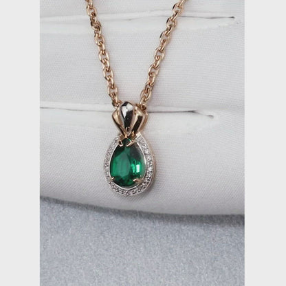 Rose Gold Pear pendant necklace with diamonds and emerald